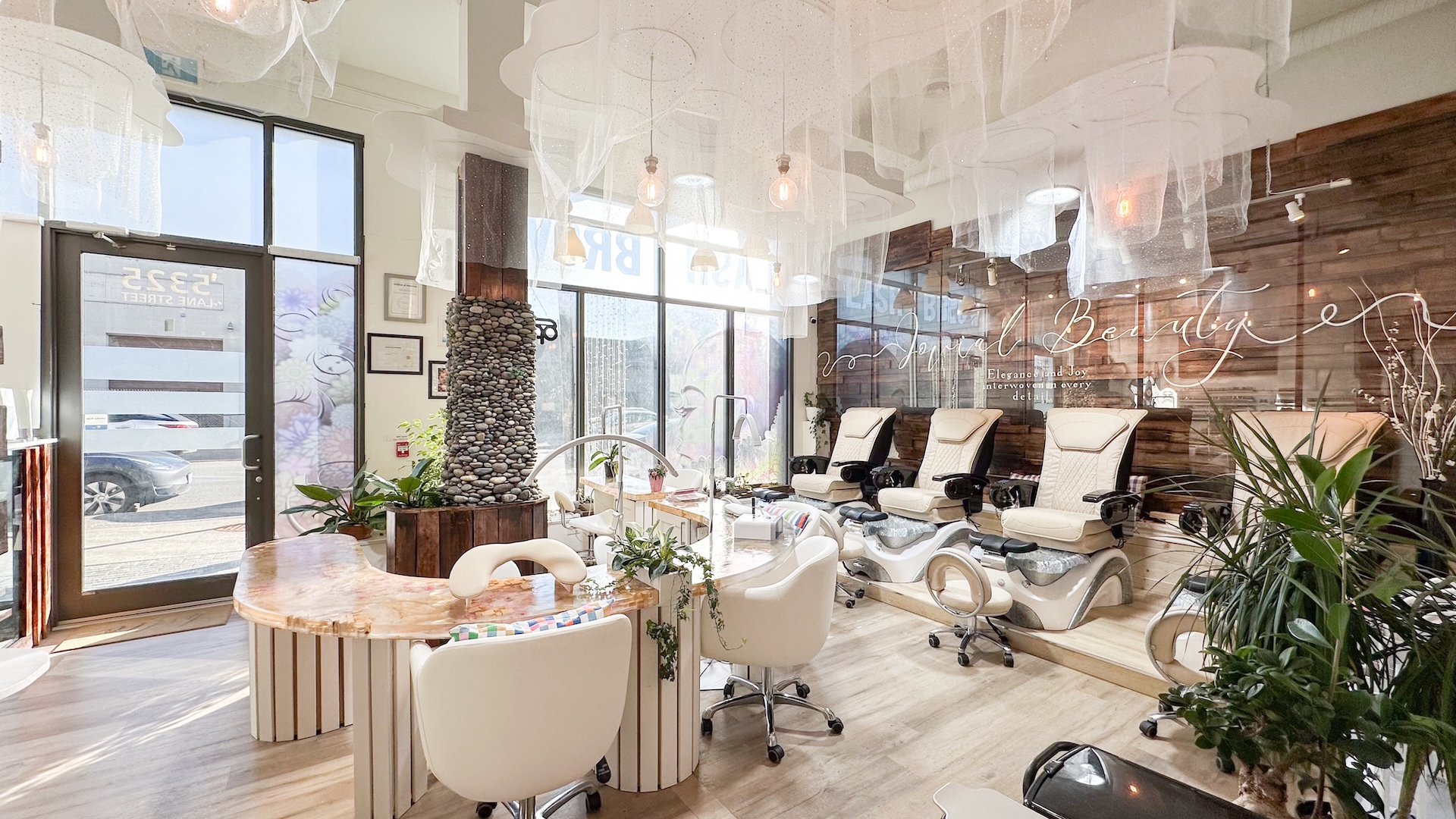 Bright salon chairs and pedicure lounge at Jovial Nail Beauty